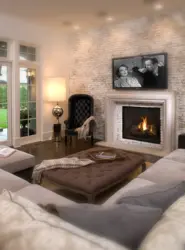 Bedroom with fireplace and TV photo