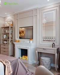Bedroom With Fireplace And TV Photo