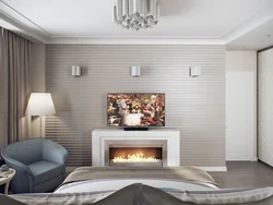 Bedroom With Fireplace And TV Photo