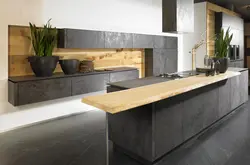 Concrete kitchen with wooden countertop in the interior