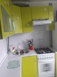 Small Kitchen Design With Gas Stove And Refrigerator