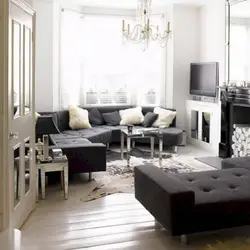 Living room interior with black and white sofa