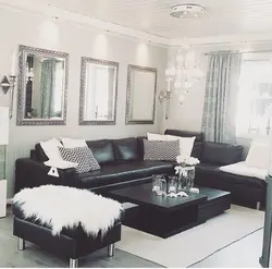 Living room interior with black and white sofa