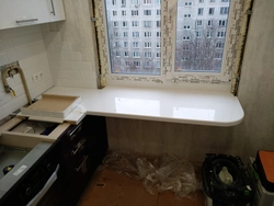 Photo of a kitchen in Khrushchev with a window sill table