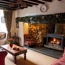 Photo of a living room in a country house with a fireplace