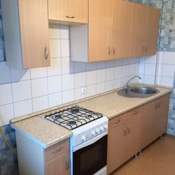 Kitchen With A Regular Gas Stove Photo