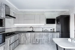 Countertops in the kitchen interior made of white gloss