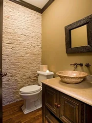 Decorative plaster and tiles in the bathroom photo