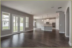 Gray floor in the interior of the kitchen living room