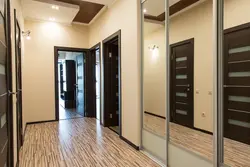 Dark doors in the hallway interior photo