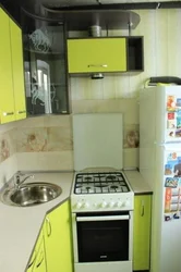 Corner kitchens in Khrushchev with a refrigerator photo
