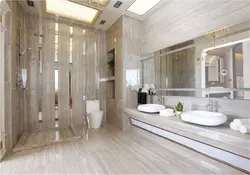 Bathroom design marble and wood tiles