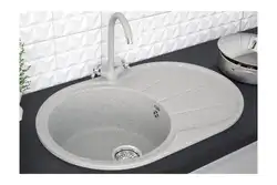 Kitchen With A Round Sink Made Of Artificial Stone Photo