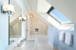 Bathroom design with a window in the attic
