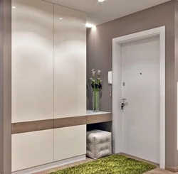 Hallway in a modern design style, bright with a wardrobe
