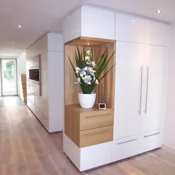 Hallway in a modern design style, bright with a wardrobe