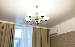 Photo of suspended ceilings in the bedroom with cornice