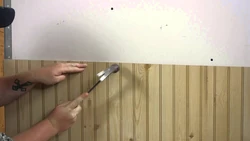 How to glue a panel to a wall in the kitchen photo