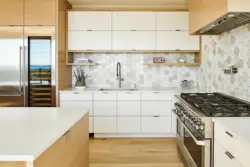 Apron and floor in the kitchen with one tile photo