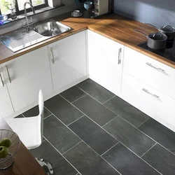 Apron And Floor In The Kitchen With One Tile Photo