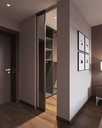 Dressing room with compartment door to the hallway photo