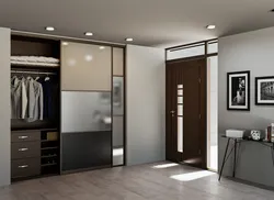 Dressing room with compartment door to the hallway photo