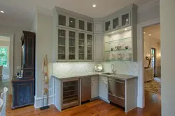 Corner kitchen design with display cabinets