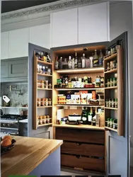 Photo of kitchen in apartment cabinets