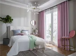 Curtains with roses in the bedroom interior