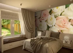 Curtains with roses in the bedroom interior