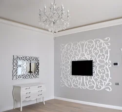 Walls with baguettes in the living room interior