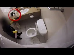 Hiding camera in bathroom photo