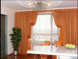 Photo of curtains for the kitchen if the wallpaper is orange