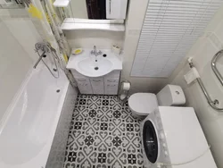 Square bathroom design with toilet and washing machine