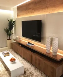Подвесные телевизоры в интерьере гостиной