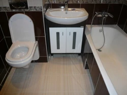 Inexpensive renovation of a bathroom combined with a toilet photo