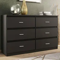 Chest of drawers for clothes in the bedroom photo