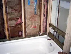 Finishing A Bathroom In A Wooden House With Plastic Panels Photo
