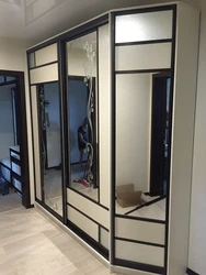 Wardrobe with mirror in the hallway photo