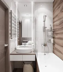 Interior of a small bathroom with toilet tiles