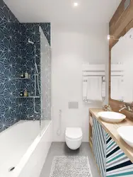 Interior of a small bathroom with toilet tiles
