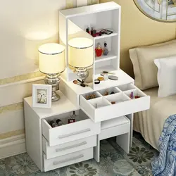 Bedroom interior with chest of drawers and dressing table