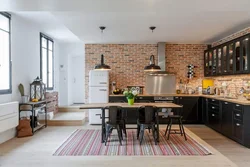 Photo of kitchen interior with red brick