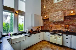 Photo of kitchen interior with red brick