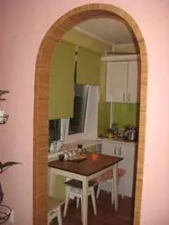 Arch to the kitchen photo in a small apartment