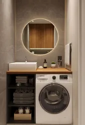 Cabinet for washing machine in bathroom photo
