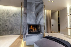 Fireplace in the interior of the living room in marble