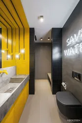 Серо желтый интерьер ванной
