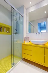 Gray yellow bathroom interior