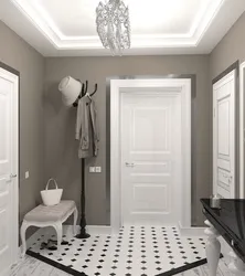 Дизайн прихожей в квартире с белыми дверями фото